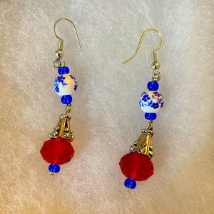 Handmade one of a kind blue ceramic bead and red glass bead earring